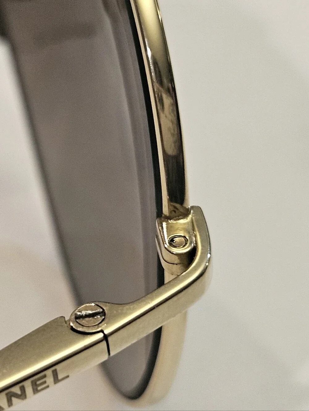 Chanel 4189-T-Q Titanium Polarized Aviator Sunglasses GoldThese are authentic